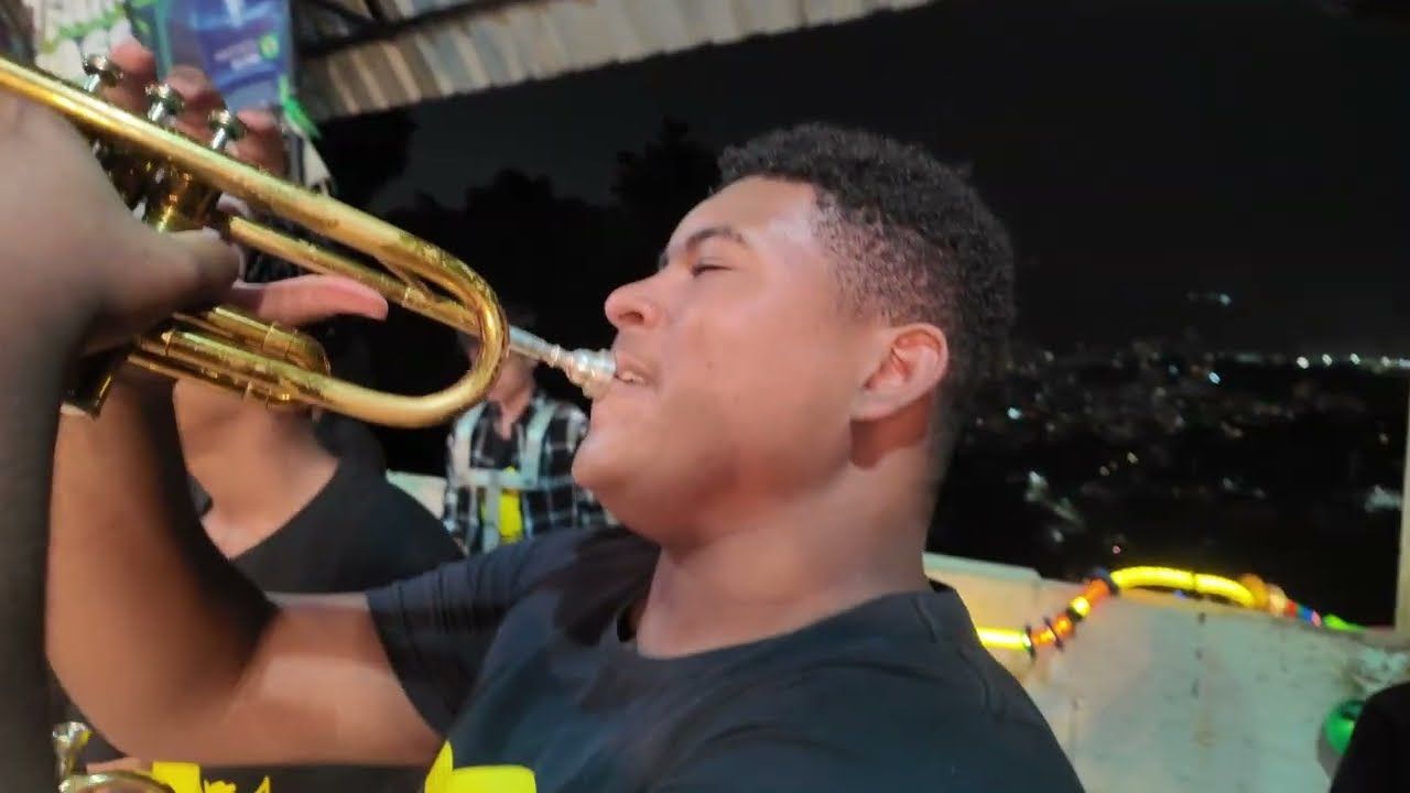 Favela Brass trumpeter playing Taj Mahal at the Baile Brass in Pereira da Silva